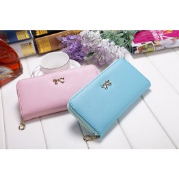Long women’s leather colorful wallet with a bow tie emblem